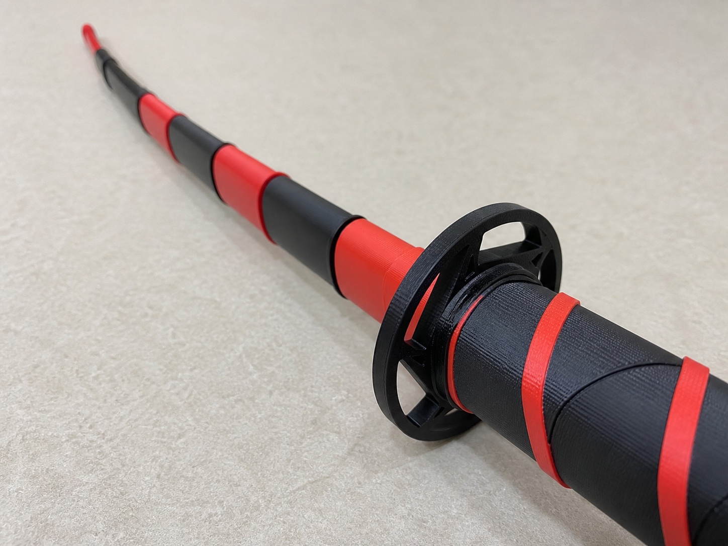 Katana Retráctil — detalle de textura
