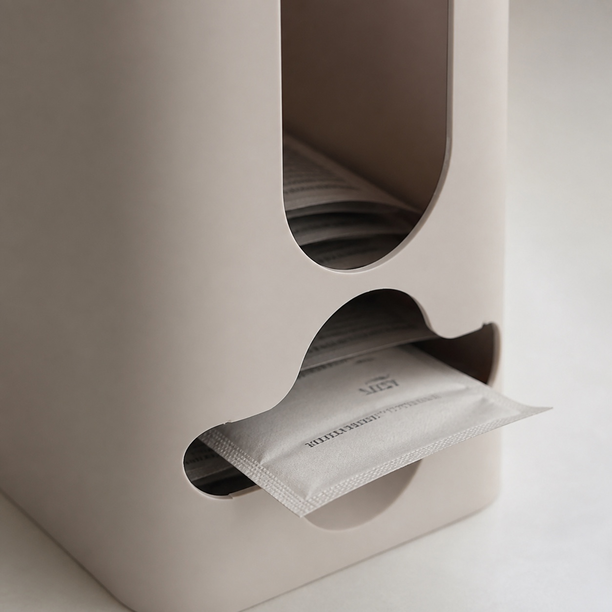 Dispensador de Sobres Misu — detalle de textura